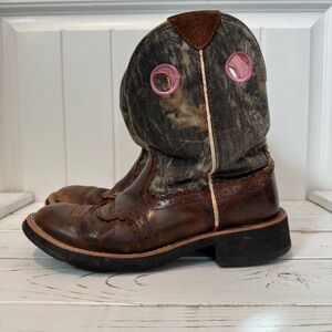 Well loved Brown and Camouflage Ariat Boots